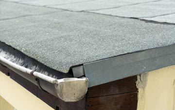 repair or replace Bach Y Gwreiddyn flat roofing?